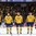 MALMO, SWEDEN - JANUARY 2: Sweden's Nick Sorensen #23, Christian Djoos #4, Jacob de la Rose #9, Oskar Sundqvist #29 and Filip Sandberg #21 look on during the national anthem after a 6-0 quarterfinal win over Slovakia at the 2014 IIHF World Junior Championship. (Photo by Andre Ringuette/HHOF-IIHF Images)